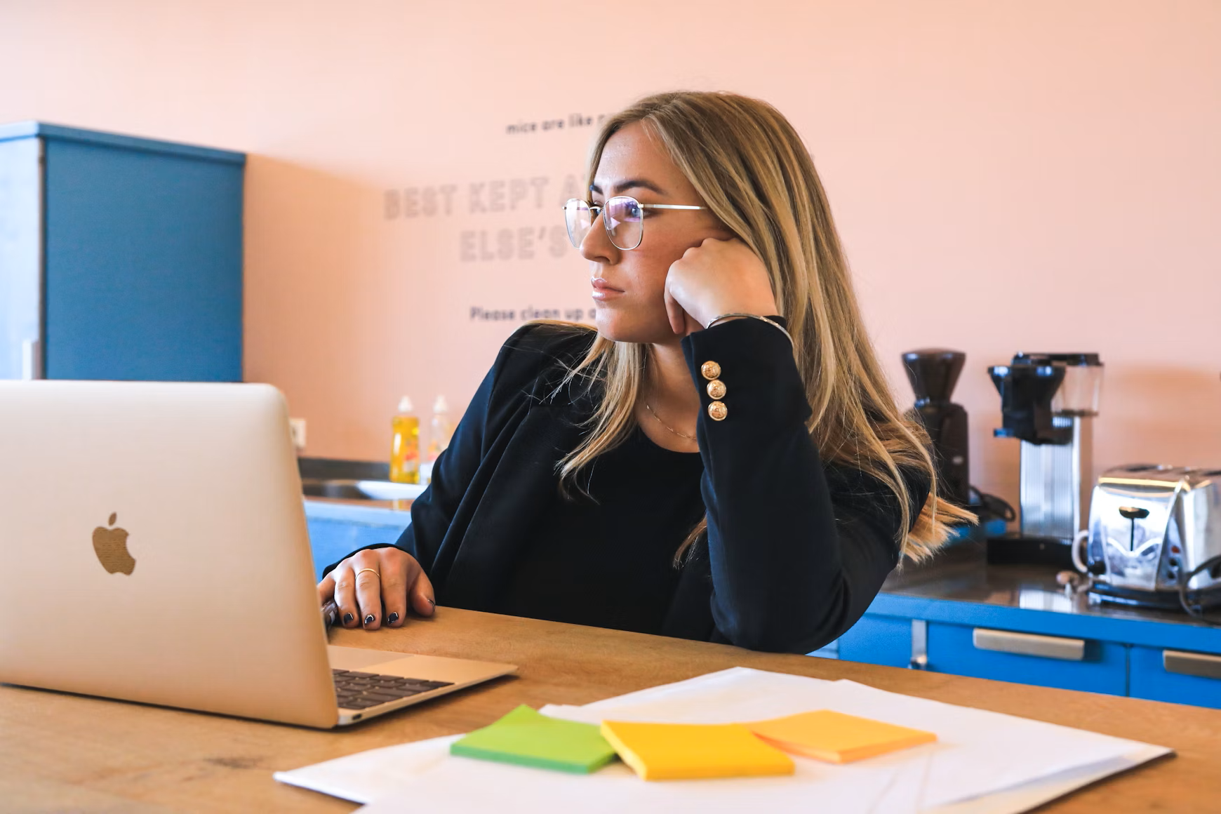 Person thinking while on laptop